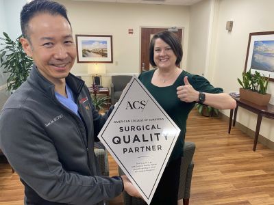 (l-r) Seon Jones, MD, medical director of Trident Medical Center's Trauma Department, and Jennie Kellams, MSN, RN, CCRN, TCRN celebrate the hospital earning it's third consecutive three-year reverification from the American College of Surgeons without any deficiencies.